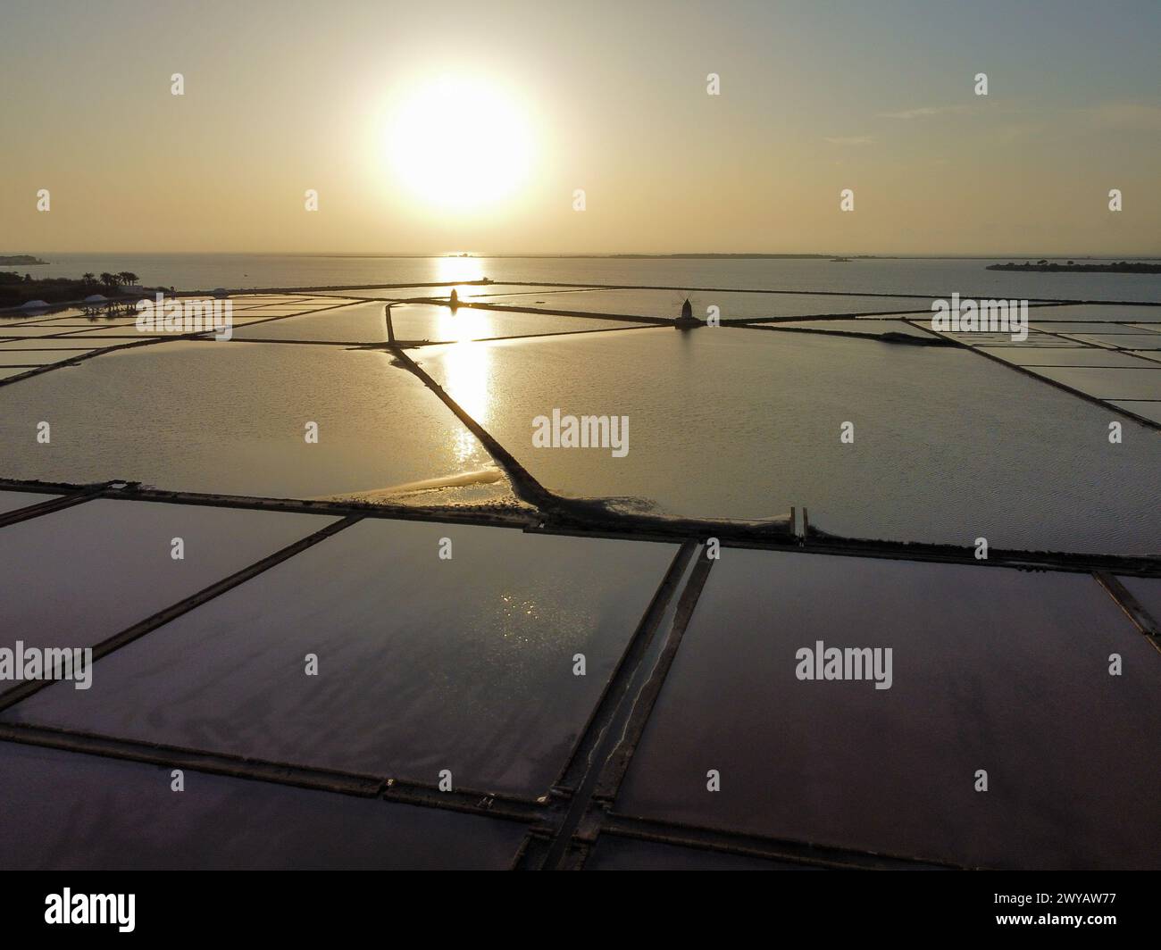 aerial view of the Stagnone salt pans and the ancient windmills at ...