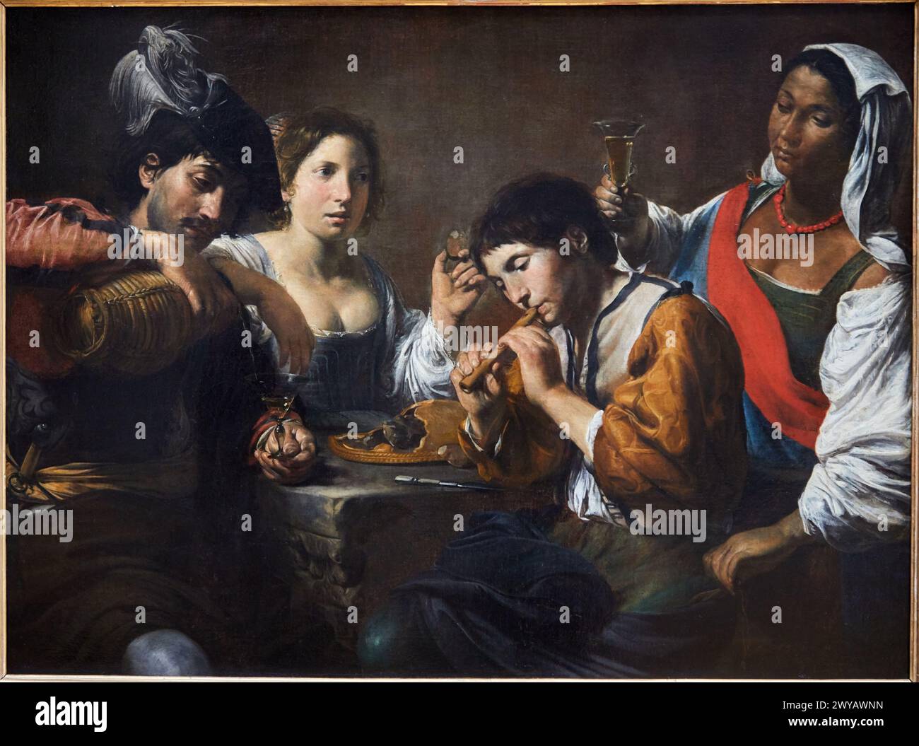 "Gathering in a Tavern", 1623-1625, Valentin de Boulogne, dit Le Valentin, Musée du Louvre, Paris, France, Europe. Stock Photo