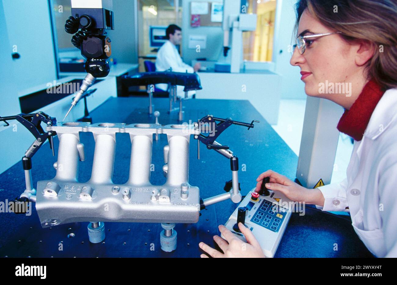 High precision metrology, coordinate measuring machine, aluminum car engine component. Stock Photo