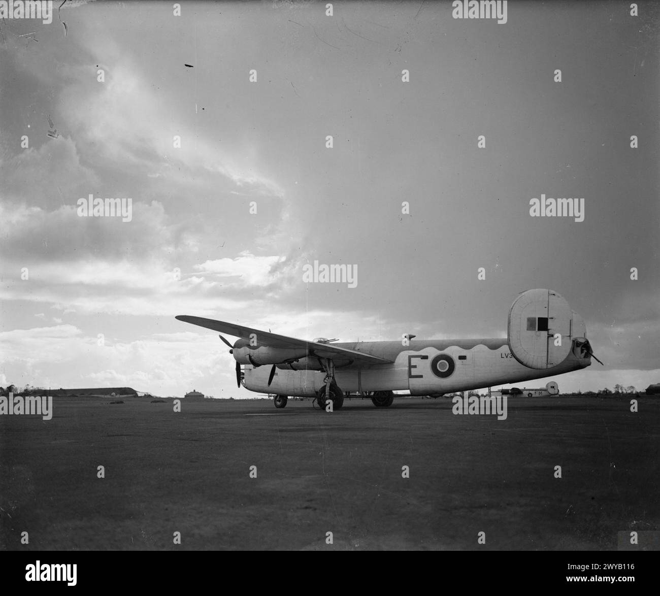 AMERICAN AIRCRAFT IN ROYAL AIR FORCE SERVICE 1939-1945: CONSOLIDATED MODEL 32 LIBERATOR. - Liberator GR Mark IIIA, LV345 'E', parked in a dispersal at Aldergrove, County Antrim, at the culmination of its service with of No. 86 Squadron RAF, and shortly before joining the Liberator Flight of No. 1 (Coastal) Operational Training Unit at Beaulieu, Hampshire. , Royal Air Force, Royal Air Force Regiment, Sqdn, 86, Royal Air Force, Air Observers School, 3, Bobbington Stock Photo
