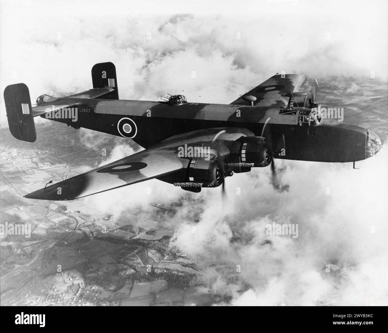 AIRCRAFT OF THE ROYAL AIR FORCE 1939-1945: HANDLEY PAGE HP.57 HALIFAX. - Halifax B Mark III, LV857, in flight shortly after completion by the Handley Page Ltd works at Radlett, Hertfordshire. In its brief service life, this aircraft served with Nos. 35, 10 and 51 Squadrons RAF before crashing at Schwarzbad while returning from a raid on Nuremberg on 31 May 1944. , Royal Air Force, 10 Squadron, Royal Air Force, Royal Air Force Regiment, Sqdn, 35, Royal Air Force, Royal Air Force Regiment, Sqdn, 51 Stock Photo