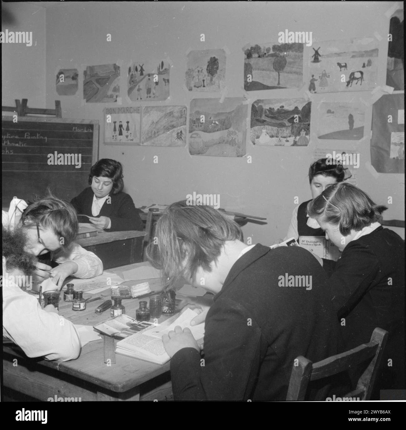 Producing A Class Girls at a Classifying School in Britain participate in a painting ...