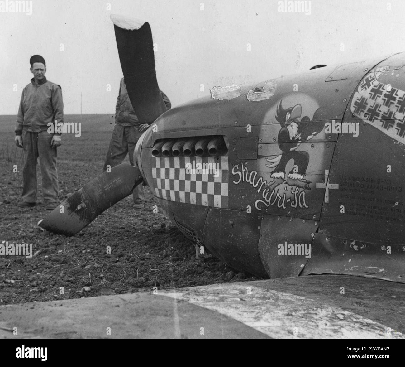 UNITED STATES EIGHTH AIR FORCE IN BRITAIN, 1942-1945 - Capt. Don Gentile's P-51B Mustang 'Shangri-La' after crash landing on 13 April 1944 as Gentile arrived back at the 4th Fighter Group's Debden air base after his last mission.Printed caption attached to print:'Captain Gentile crashes after big raid over continent, 14.4.44'And: 'Captain Don S. Gentile, 23-year-old flight leader in a U.S. 8th Air Force Mustang Group, who now is the top-scoring American ace in the European Theatre, crash-landed yesterday April 13th [date censored] after taking part in the big raid. Not known yet whether he bro Stock Photo