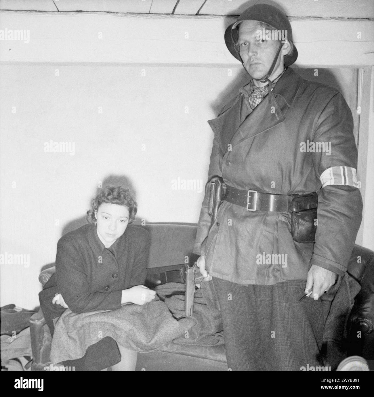 NORWAY AFTER LIBERATION - Ruth Anderson, the only Norwegian woman to work at the Gestapo HQ, under arrest and awaiting trial. , Stock Photo