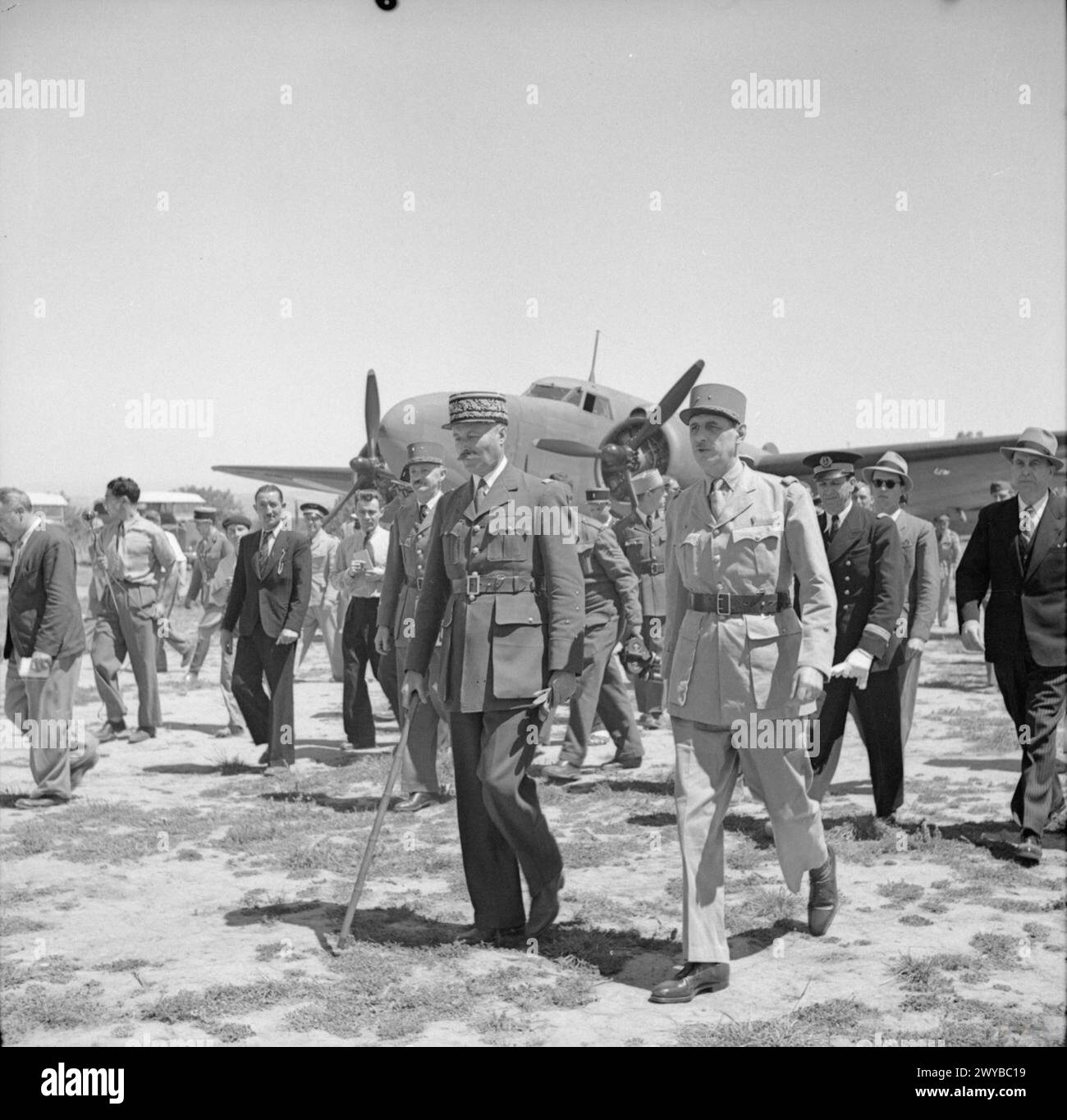 THE FREE FRENCH DURING THE SECOND WORLD WAR - General de Gaulle with General Giraud walking from his plane following de Gaulle's arrival in North Africa. De Gaulle had travelled for talks with Giraud, Commander in Chief of French Forces in North Africa; these talks resulted in a new French Committee of National Liberation of which de Gaulle and Giraud were joint heads. , Giraud, Henri Honore, de Gaulle, Charles André Joseph Marie Stock Photo