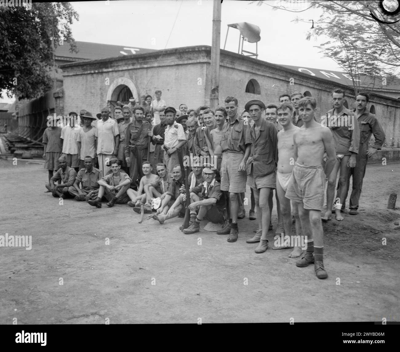 On 3 May 1945 in Rangoon, British Army personnel photographed liberated ...