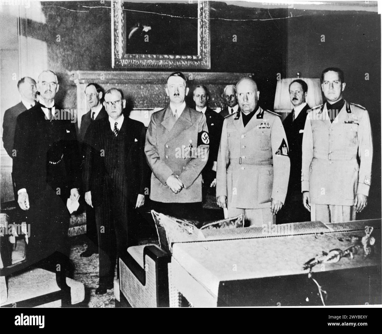 THE MUNICH AGREEMENT, SEPTEMBER 1938 - Hitler with other signatories to the Munich Agreement, 29 September 1938.From left to right: the British Prime Minister, Neville Chamberlain, the French Prime Minister, Edouard Daladier, Adolf Hitler, the Italian leader Benito Mussolini and the Italian Foreign Minister Count Galeazzo Ciano. , Hitler, Adolf, Mussolini, Benito Amilcare Andrea, Chamberlain, Neville, Daladier, Edouard, Ciano, Galeazzo Stock Photo