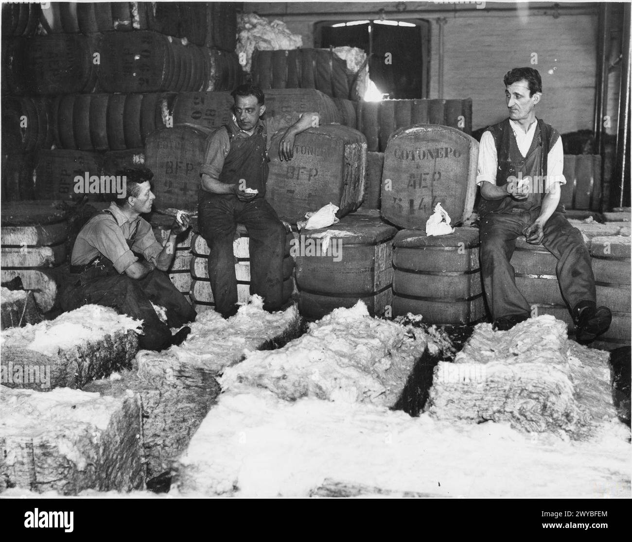 AMERICAN LEASE AND LEND FOOD BEING EATEN BY WORKERS IN THE FACTORIES OF