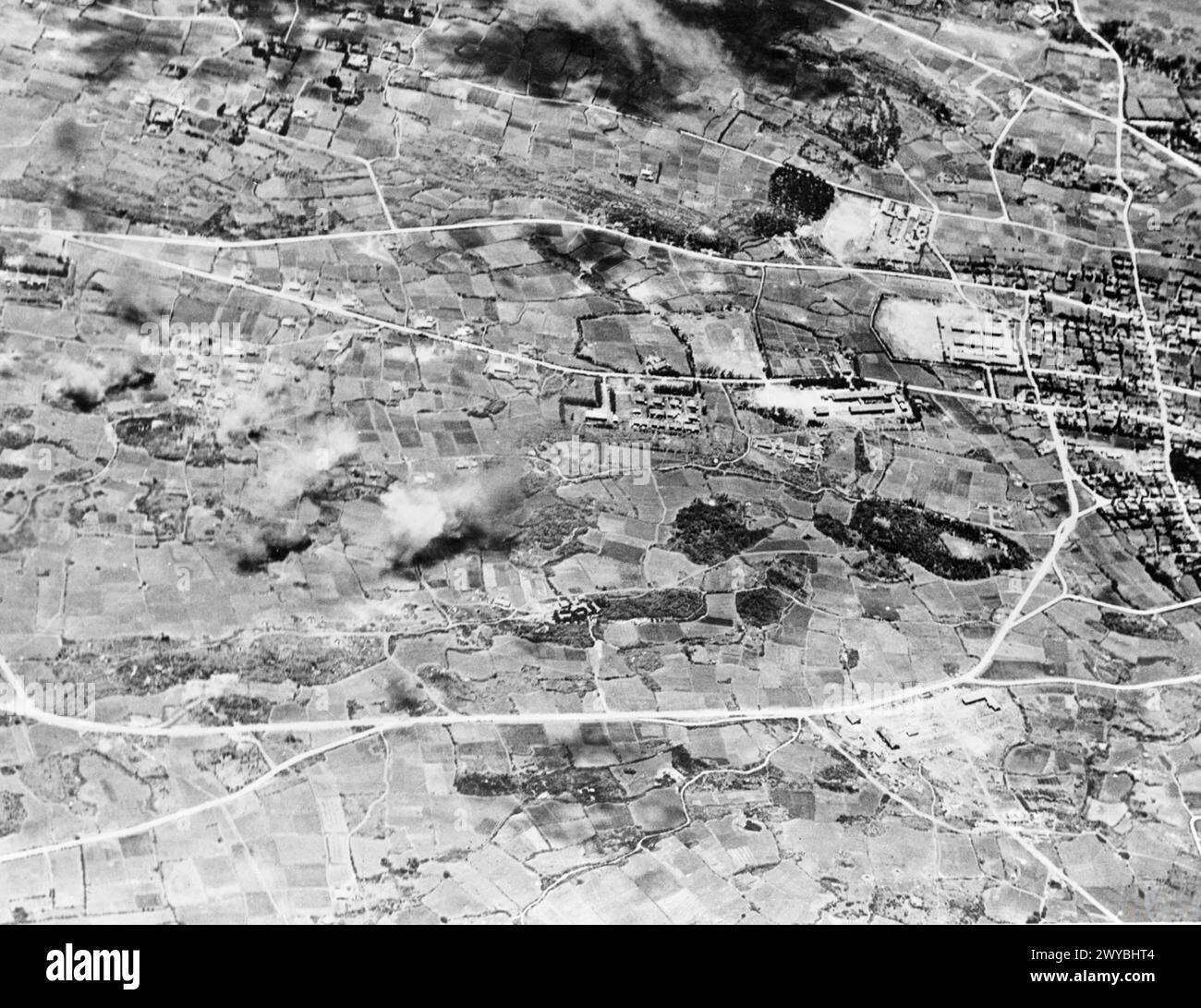 BRITISH WARSHIPS BOMBARD JAPANESE ISLAND OF MIYAKO. 4 MAY 1945, AERIAL