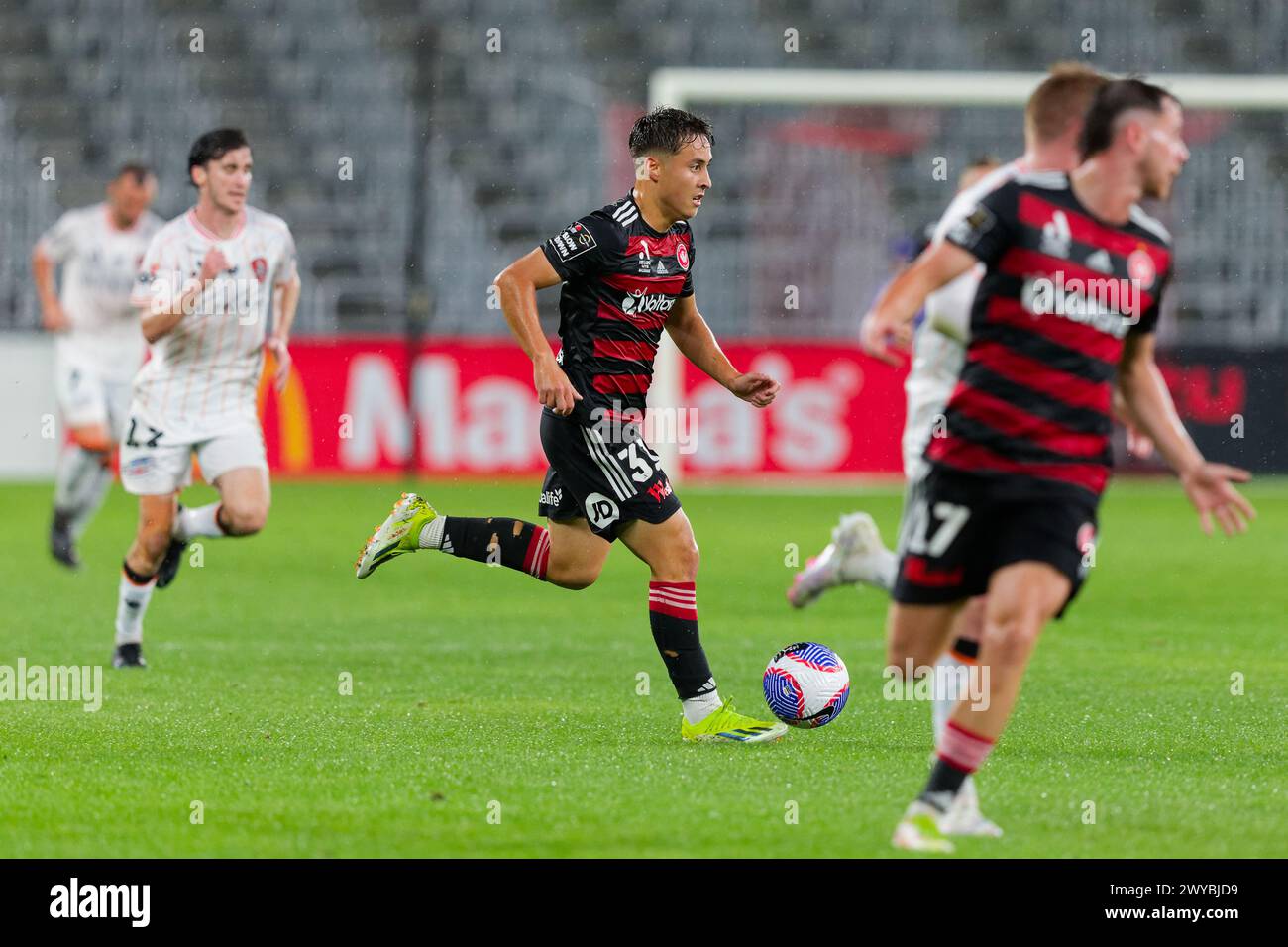 Sydney, Australia. 05th Apr, 2024. Aidan Simmons of the Wanderers controls the ball during the A-League Men Rd23 match between the Wanderers and Brisbane Roar at CommBank Stadium on April 5, 2024 in Sydney, Australia Credit: IOIO IMAGES/Alamy Live News Stock Photo