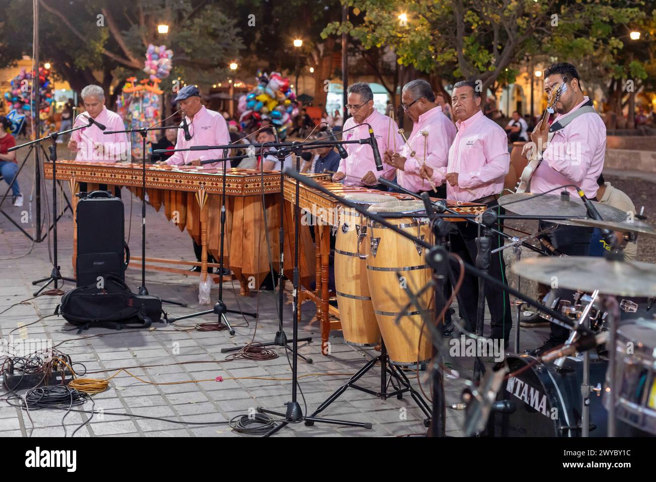 Oaxaca, Mexico - The Marimba del Estado band entertains a crowd in the zocalo. Marimba band music is traditional in southern Mexico. Stock Photo
