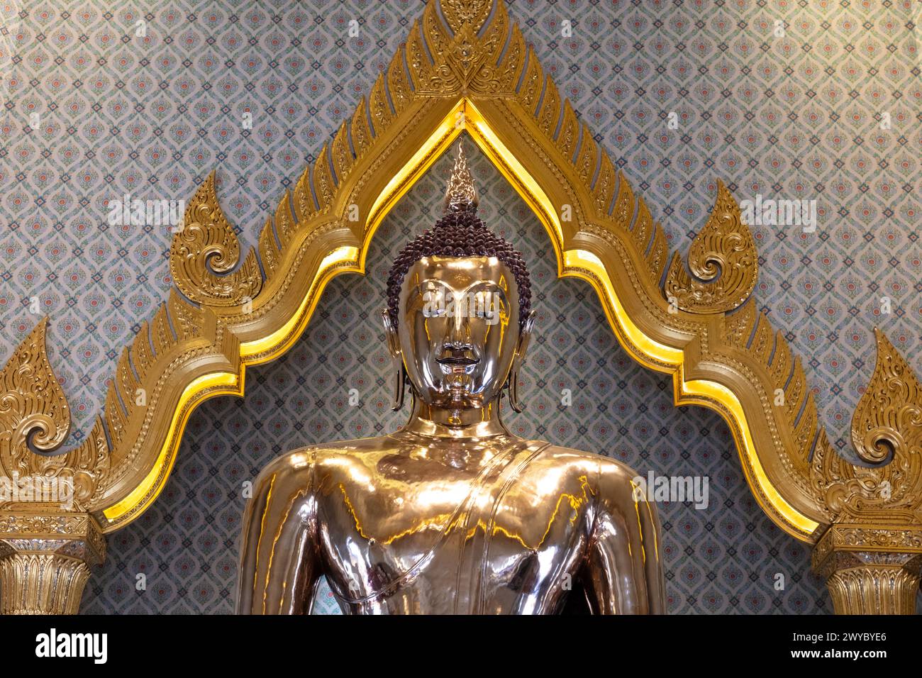 Closeup of solid gold Buddha statue, Wat Traimit (Temple of the Golden Buddha). It is 3 meters (nearly 10 feet) tall, and weighs 5.5 tons. Stock Photo