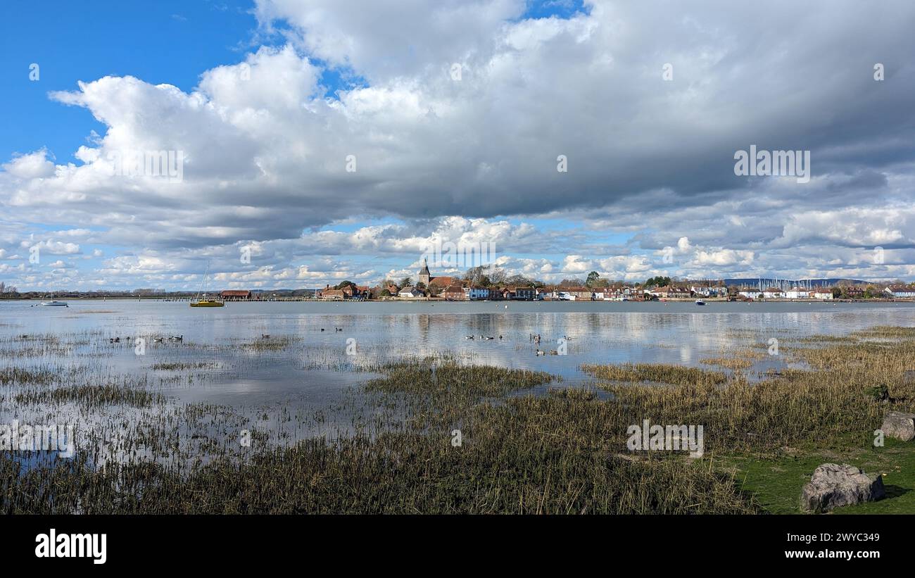 Bosham Harbour near Chichester view over the moat to the town just before sunset Stock Photo