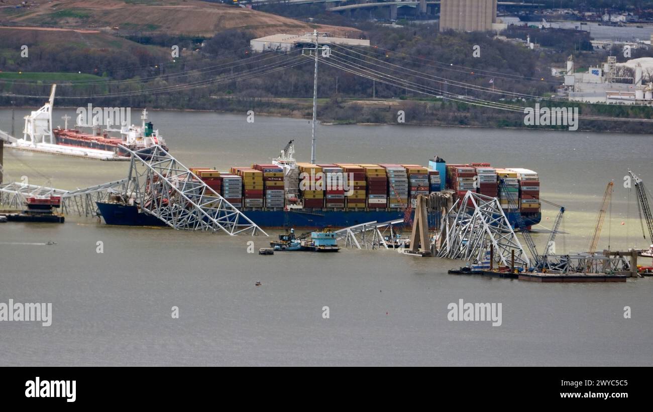 Wreckage of the Francis Scott Key Bridge rests on the container ship ...