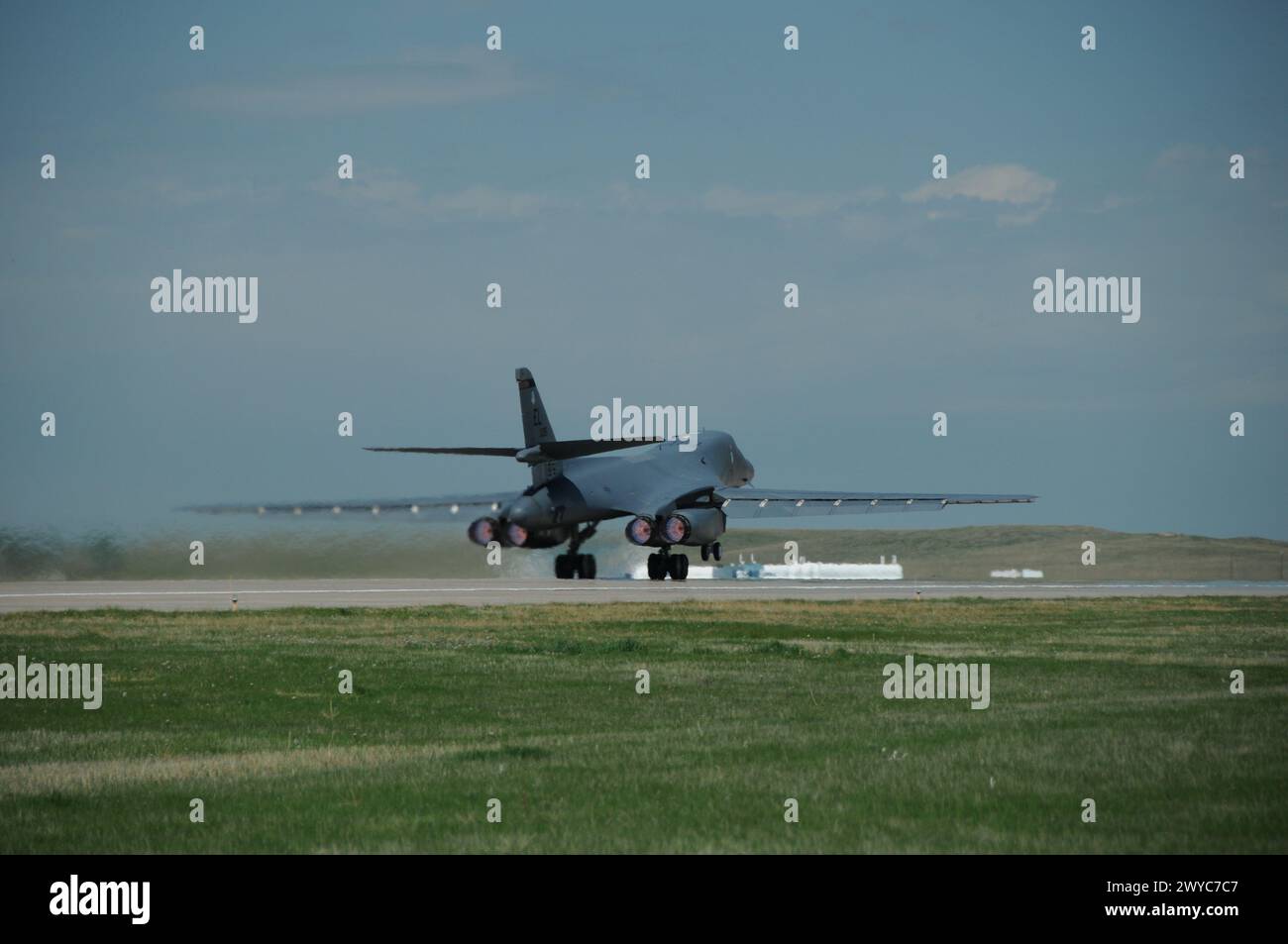 B1-B Lancer Taking Off, From Behind Stock Photo