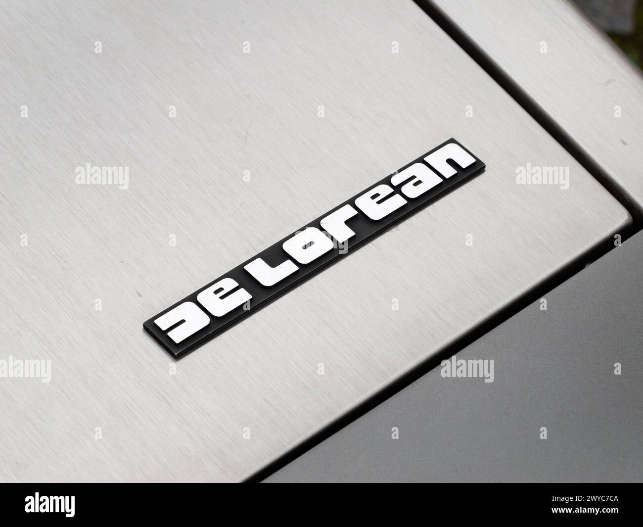 DeLorean logo sign close up of the classic sports car exterior. Emblem ...