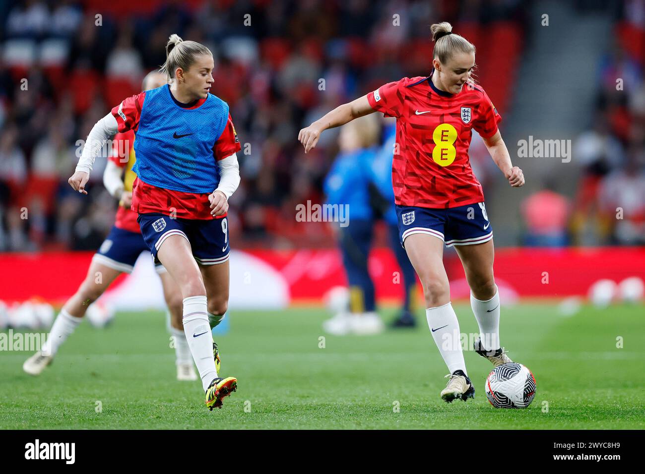 England’s Stanway (right) and Alessia Russo warm up ahead of