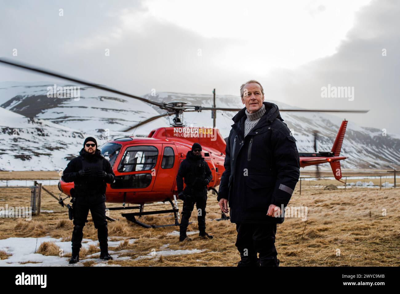 Operation Napoleon (2023) directed by Óskar Thór Axelsson and starring Iain Glen as William Carr. An ambitious lawyer is drawn into an unexpected sequence of events when her brother stumbles upon a World War II plane wreck on top of Vatnajökull, Iceland's biggest glacier. Publicity photograph.***EDITORIAL USE ONLY*** Credit: BFA / Juliette Rowland / Magnet Releasing Stock Photo