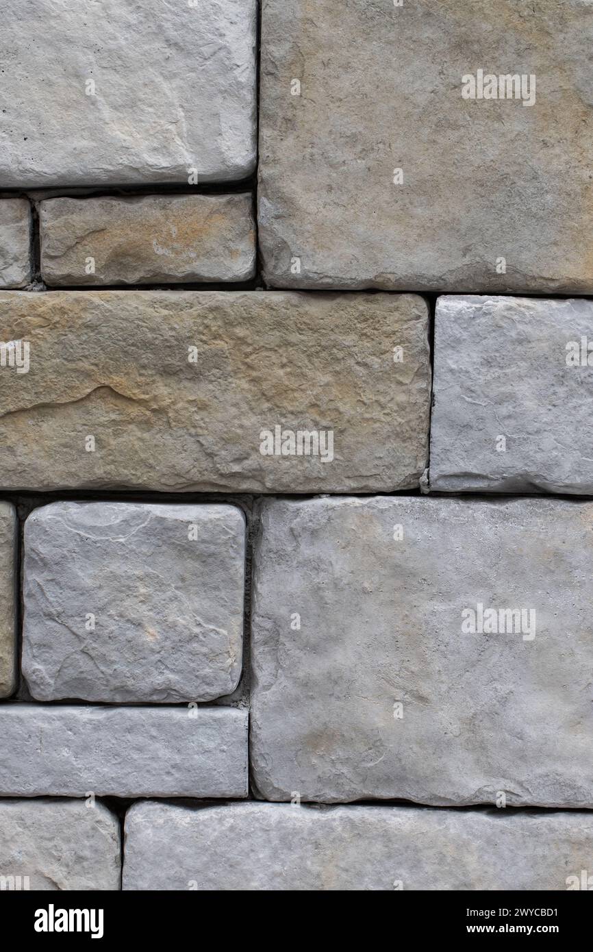 Large stone wall grey texture background, close up Stock Photo