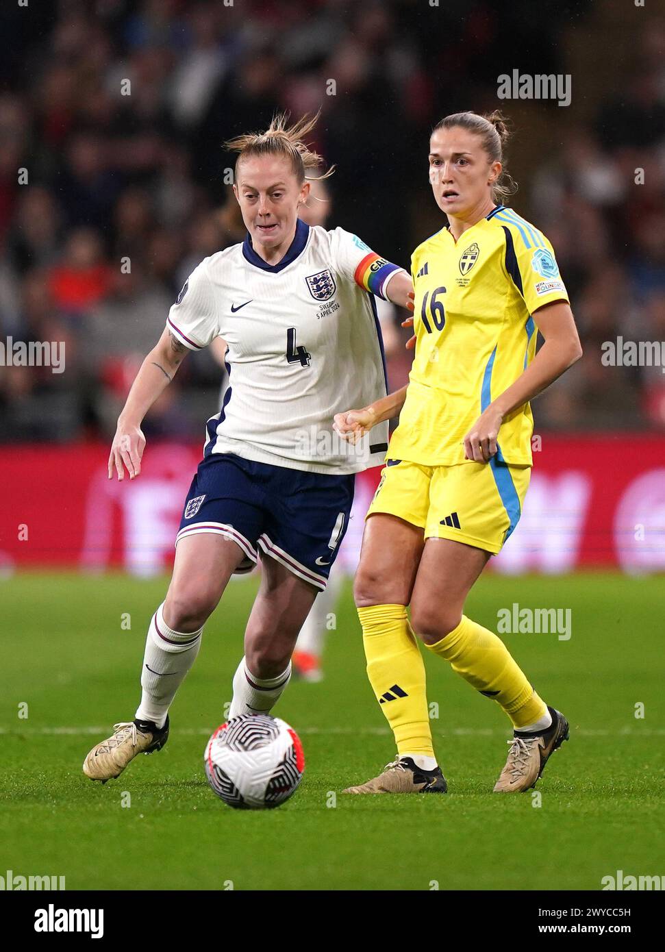 England's Keira Walsh (left) and Sweden's Filippa Angeldal battle for