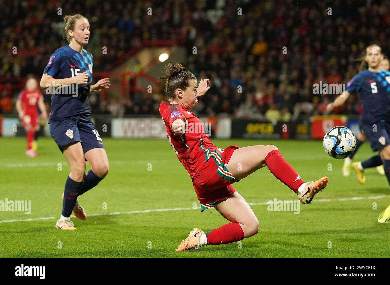 Wales’ Angharad James scores their side's fourth goal of the game