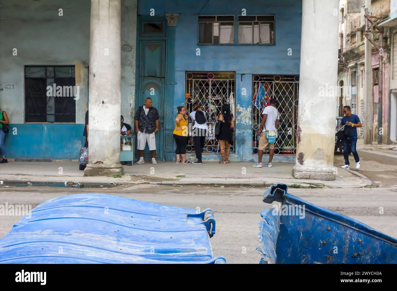 Cuban people buying from a small business in a house in Havana, Cuba Stock Photo