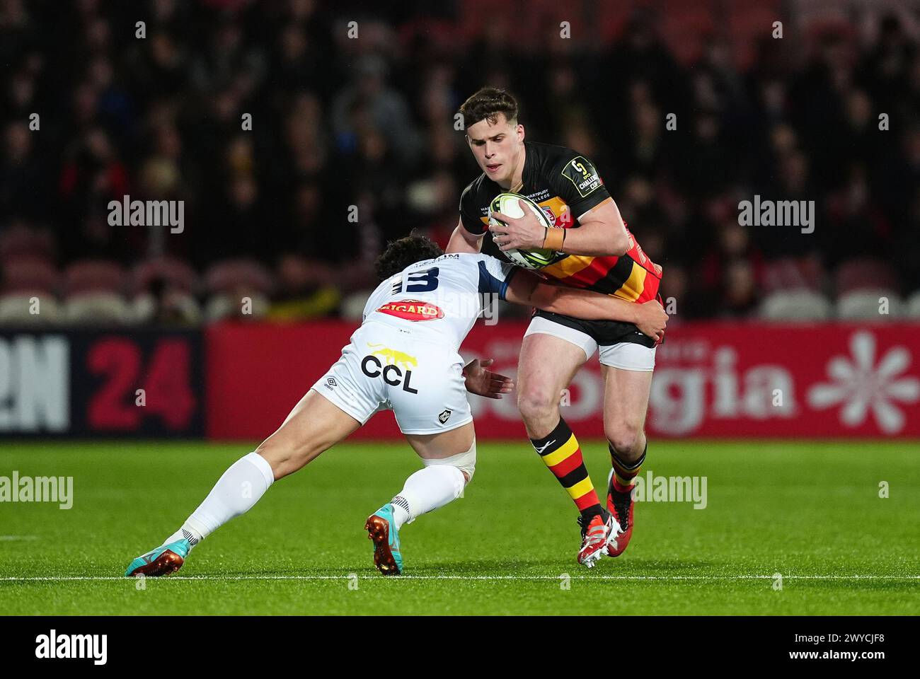 Gloucester's Seb Atkinson is tackled by Castres Olympique's Joris Dupont during the ECPR Challenge Cup Round of 16 match at Kingsholm Stadium, Gloucester. Picture date: Friday April 5, 2024. Stock Photo
