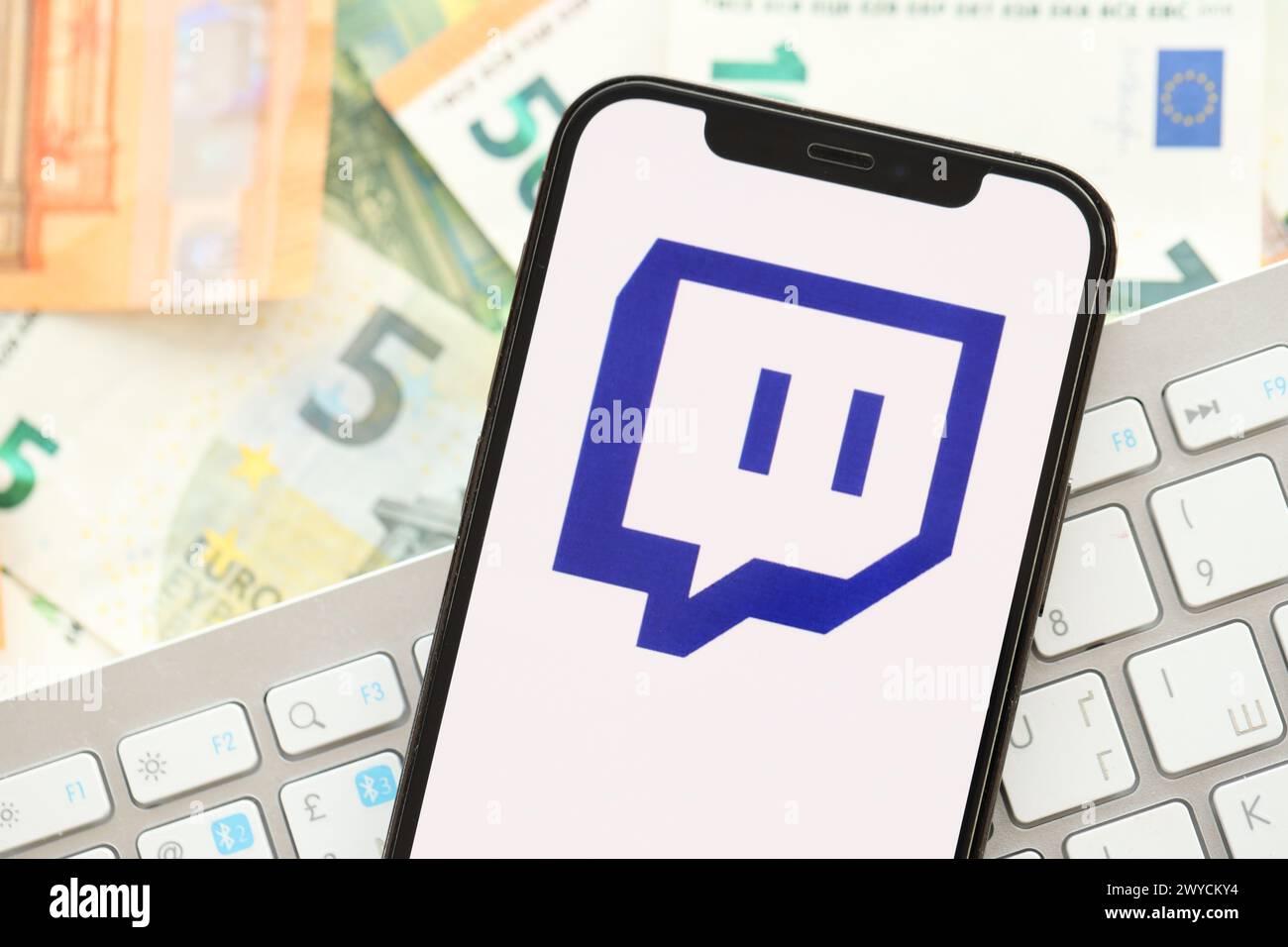 KYIV, UKRAINE APRIL 1, 2024 Twitch icon on smartphone screen on many
