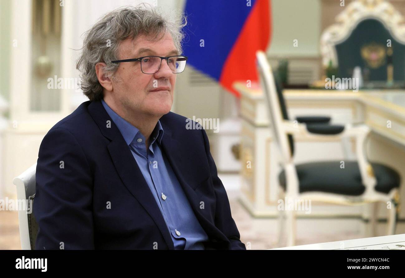 Moscow, Russia. 02 April, 2024. Serbian film director Emir Kusturica listens to Russian President Vladimir Putin during a meeting at the Kremlin, April 2, 2024 in Moscow, Russia. Credit: Mikhail Metzel/Kremlin Pool/Alamy Live News Stock Photo