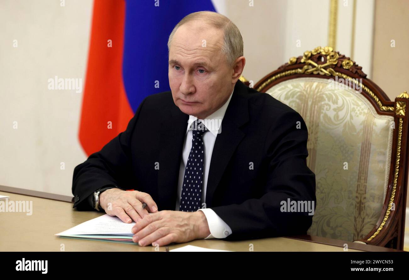 Moscow, Russia. 04 April, 2024. Russian President Vladimir Putin attends a remote ceremony by video link to open new youth centers across the country from the Kremlin, April 4, 2024 in Moscow, Russia. Credit: Mikhail Metzel/Kremlin Pool/Alamy Live News Stock Photo