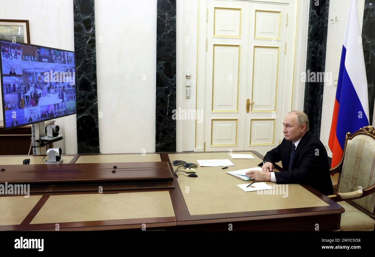 Moscow, Russia. 04 April, 2024. Russian President Vladimir Putin attends a remote ceremony by video link to open new youth centers across the country from the Kremlin, April 4, 2024 in Moscow, Russia. Credit: Mikhail Metzel/Kremlin Pool/Alamy Live News Stock Photo