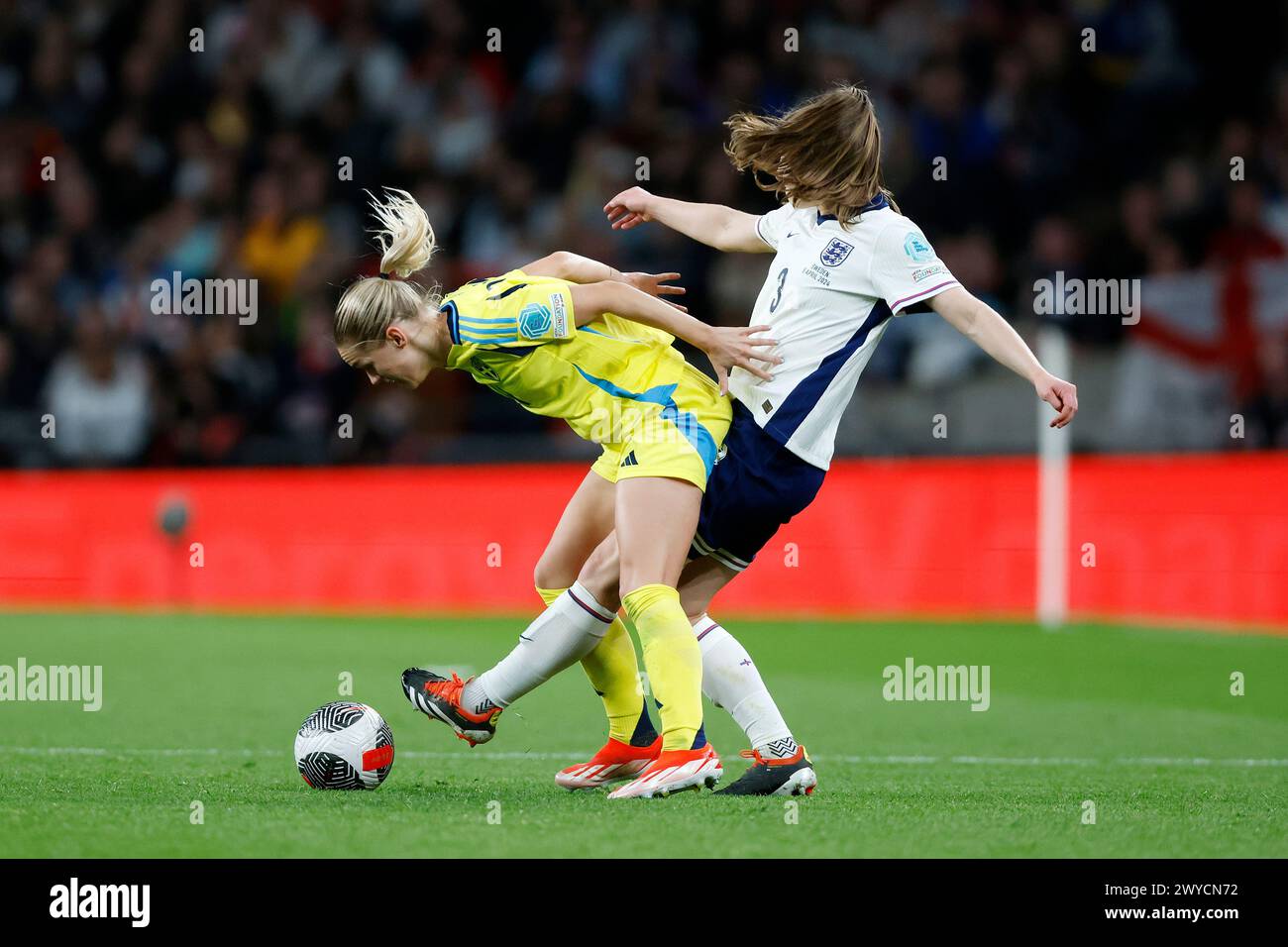 Sweden’s Hanna Lundkvist (left) and England’s Niamh Charles battle for