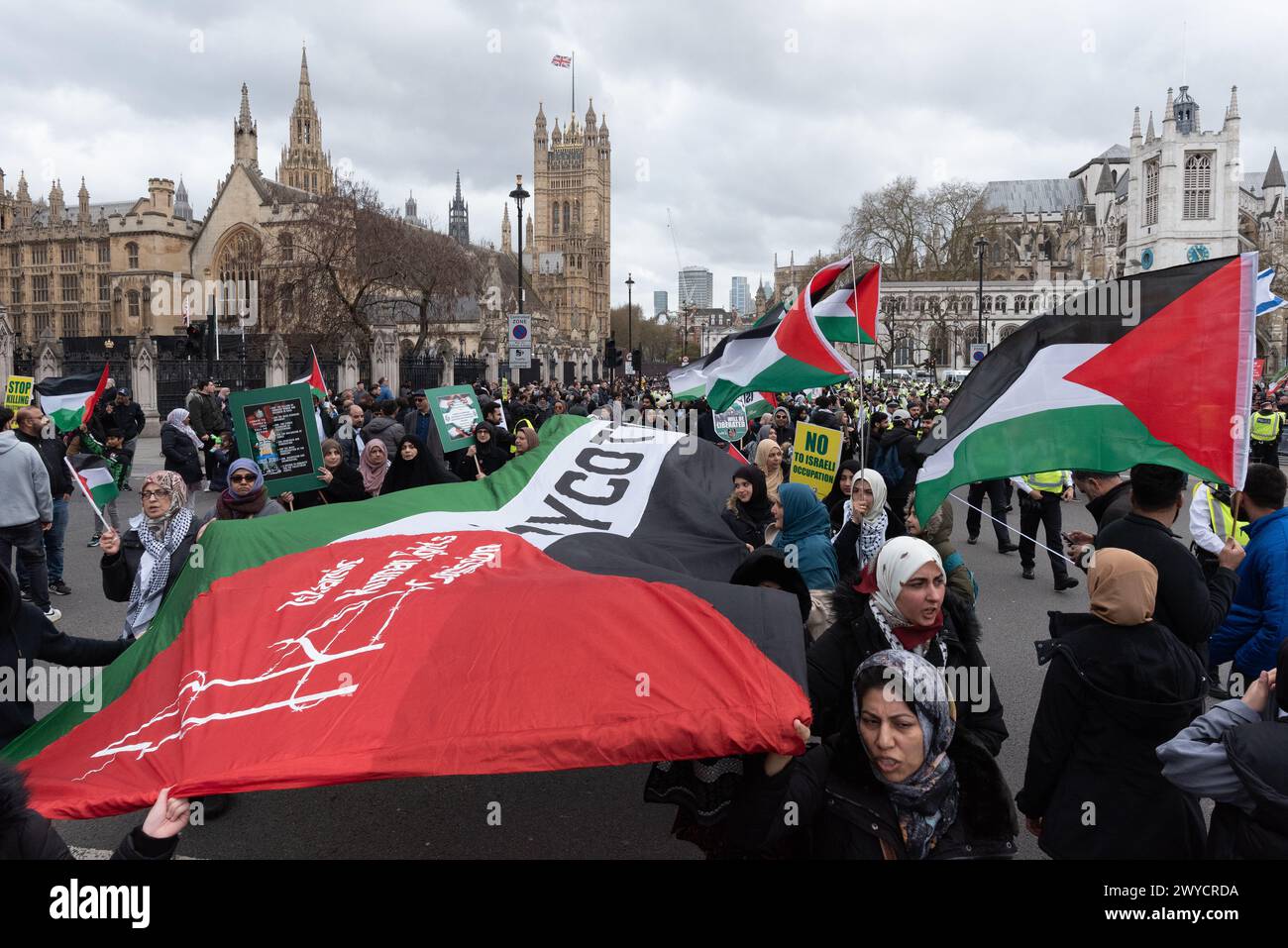 London, UK. 5 April, 2024. Palestine supporters gather for the annual Al Quds Day march in central London. The event, which refers to the Arabic name for Jerusalem, was joined by a coalition of groups including the Islamic Human Rights Commission (IHRC), Black Lives Matter UK, Jewish Network for Palestine and the Muslim Public Affairs Committee UK and saw large crowds march from the Home Office to a rally in Whitehall. Credit: Ron Fassbender/Alamy Live News Stock Photo