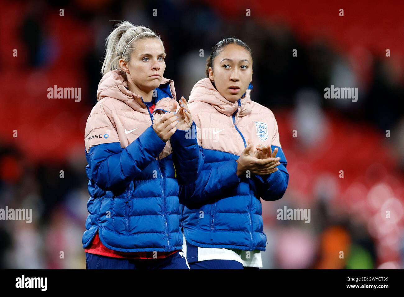 England’s Rachel Daly (left) and England’s Lauren James applaud the