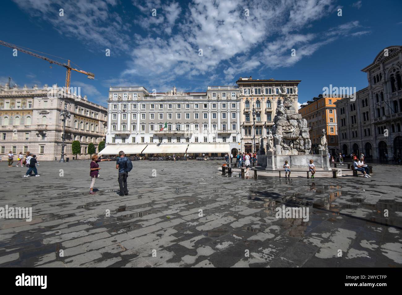 Trieste: Unity of Italy Square (Piazza Unita d' Italia) with Fountain of the Tritons. Italy Stock Photo