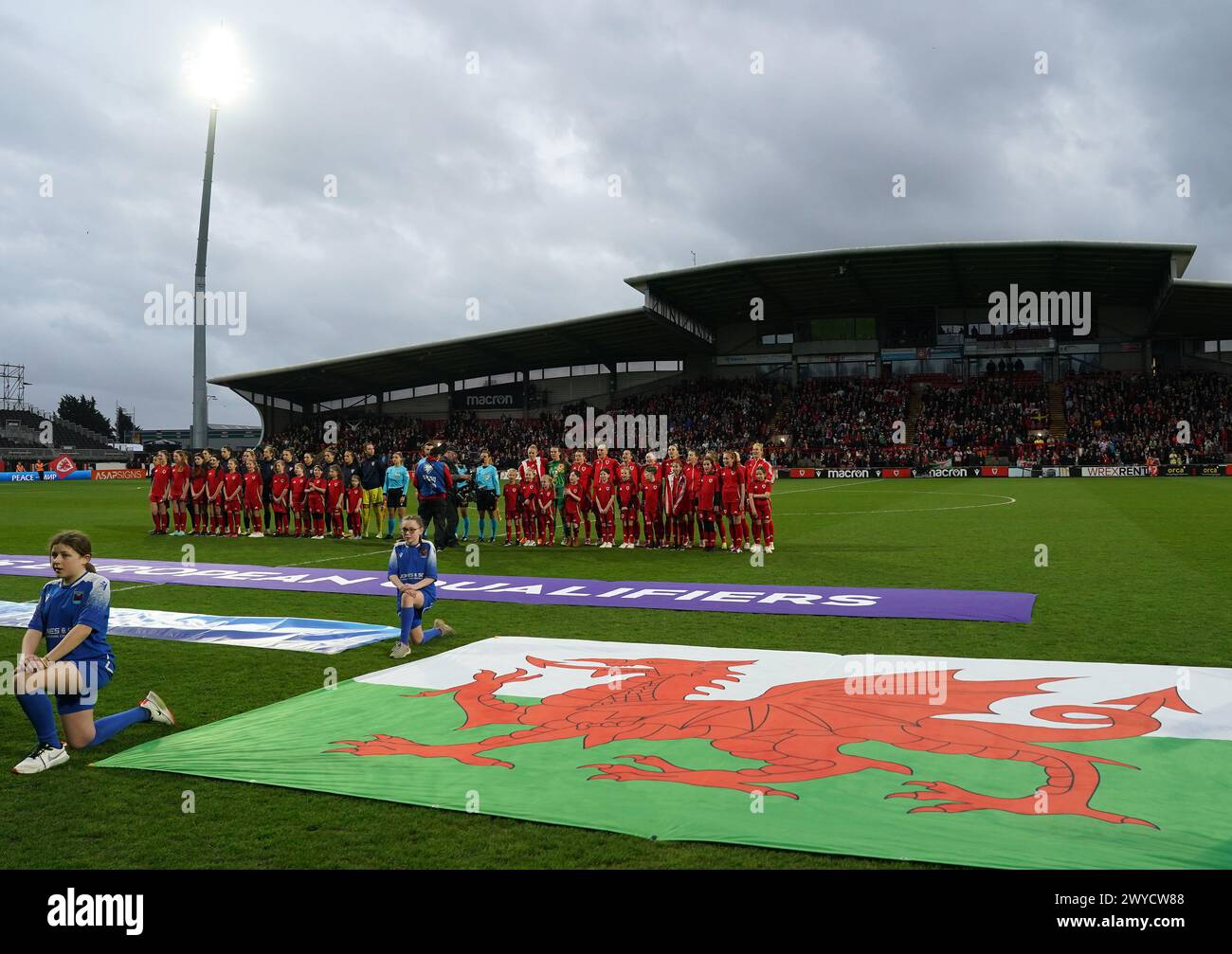 Croatia (left) and Wales (right) line up for their side’s national anthems during the UEFA Women's Euro 2025 qualifying round League B, Group B4 match at the SToK Cae Ras, Wrexham. Picture date: Friday April 5, 2024. Stock Photo
