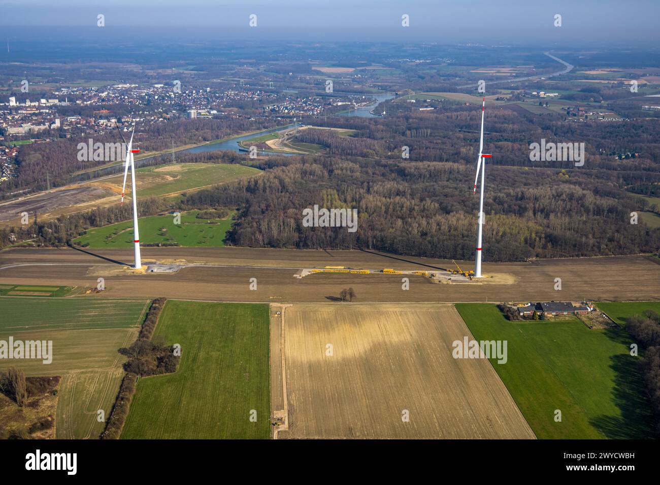 Aerial view, wind turbines construction, farming community Im Löringhof next to the Datteln 4 power plant, Dortmund-Ems canal and forest area with dis Stock Photo