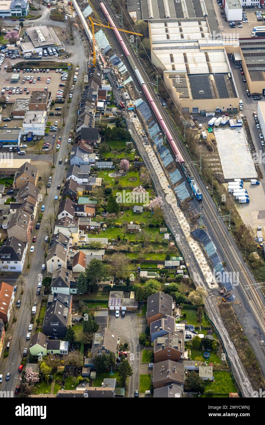 Aerial view, residential area, houses with gardens on the railroad