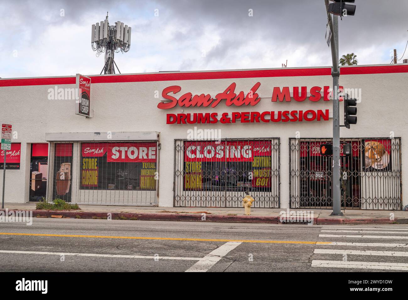 Los Angeles, CA, USA – April 5, 2024: Exterior of Sam Ash Music store on Sunset boulevard advertises its store closure in Los Angeles, CA. Stock Photo