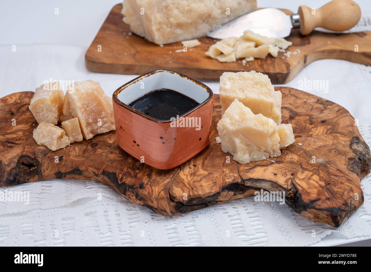 Tasting of 24 and 48 months aged in caves Italian parmesan hard cheese ...