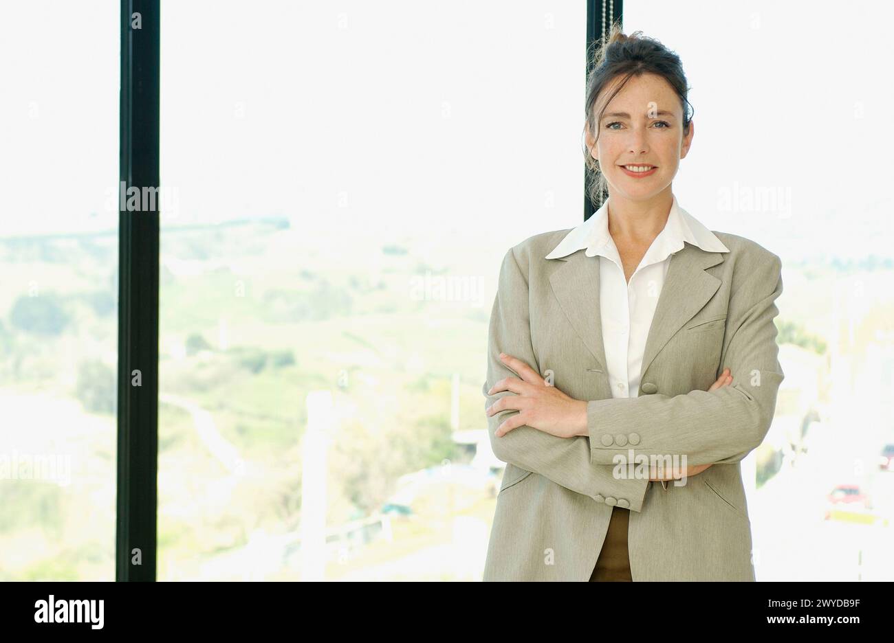Woman cross arms x hi-res stock photography and images - Alamy