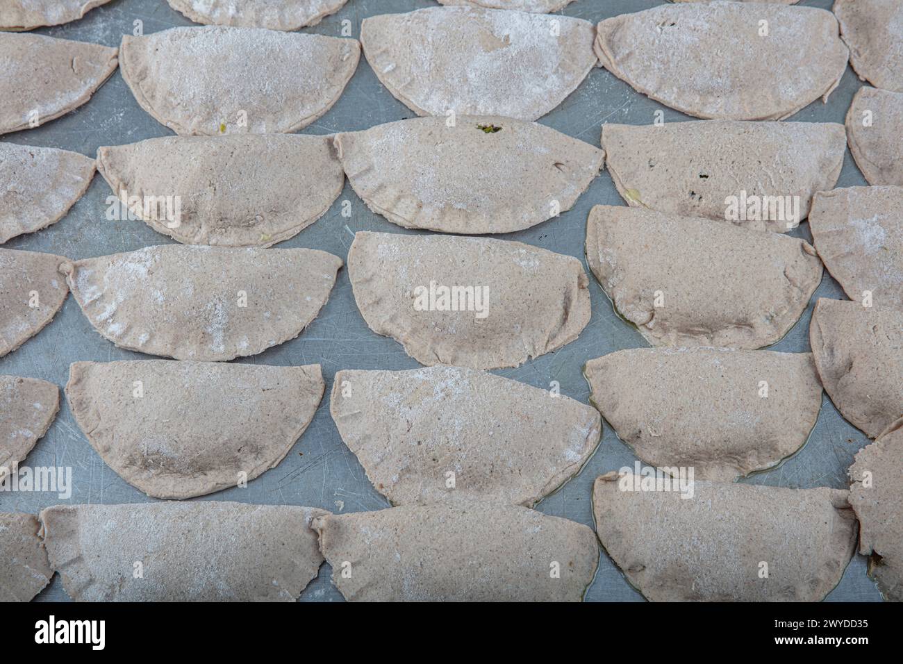 Leek pastry made from buckwheat flour. Homemade savory hand pies