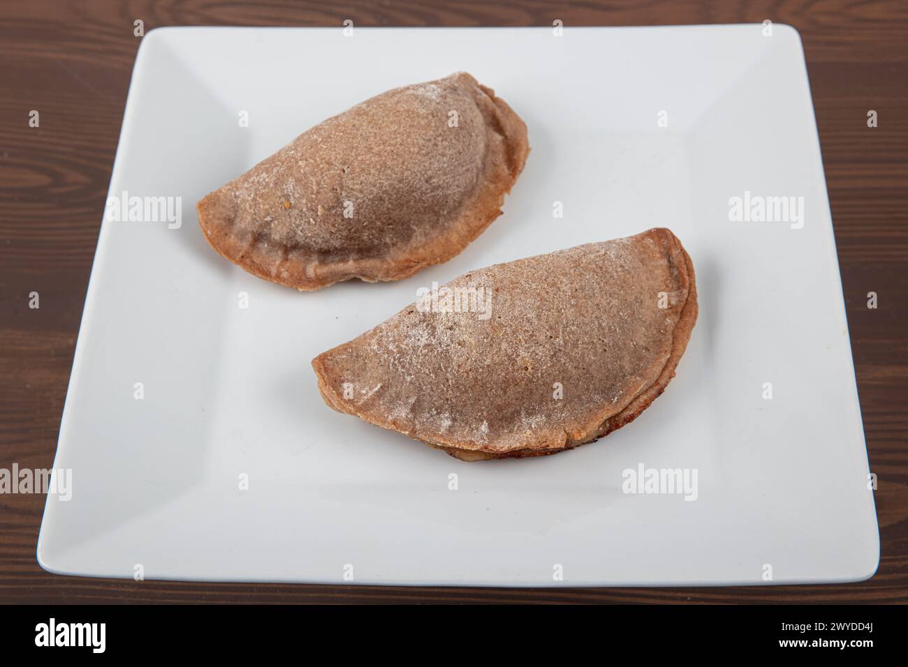 Leek pastry made from buckwheat flour. Homemade savory hand pies