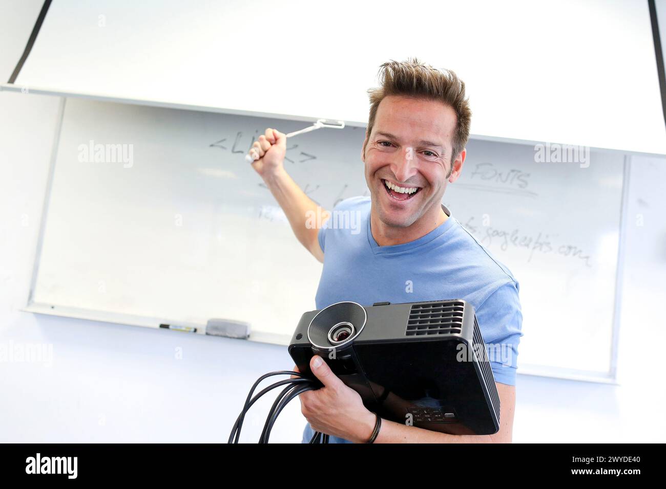 Executive with screen and projector. Office Stock Photo - Alamy