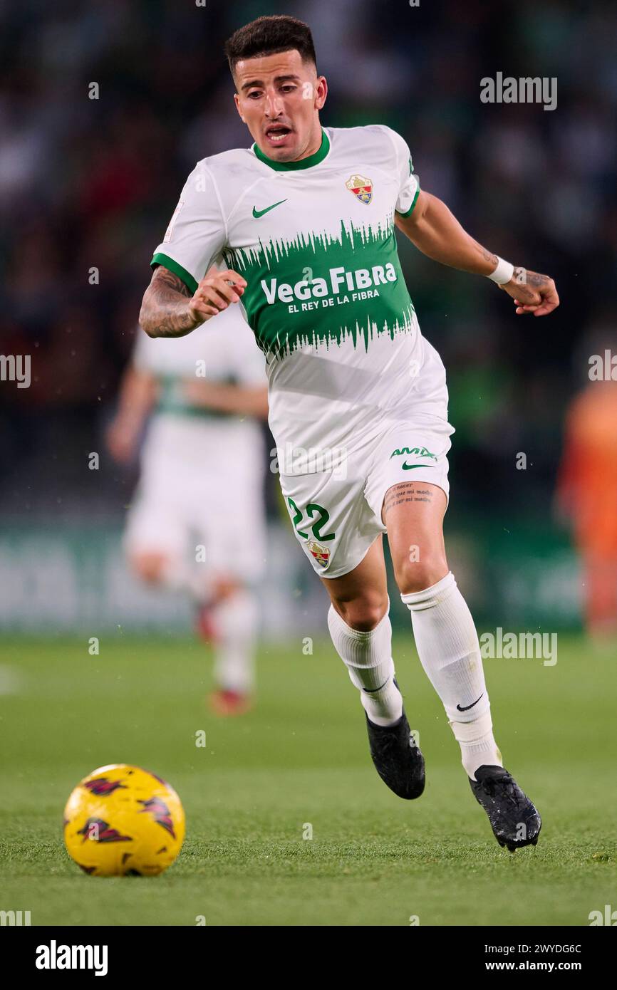 ELCHE, SPAIN - APRIL 5: Nico Fernandez Left-Back of Elche CF runs with the ball during the LaLiga Hypermotion match between Elche CF and Real Oviedo at Manuel Martinez Valero Stadium, on April 5, 2024 in Elche, Spain. (Photo By Francisco Macia/Photo Players Images) Stock Photo