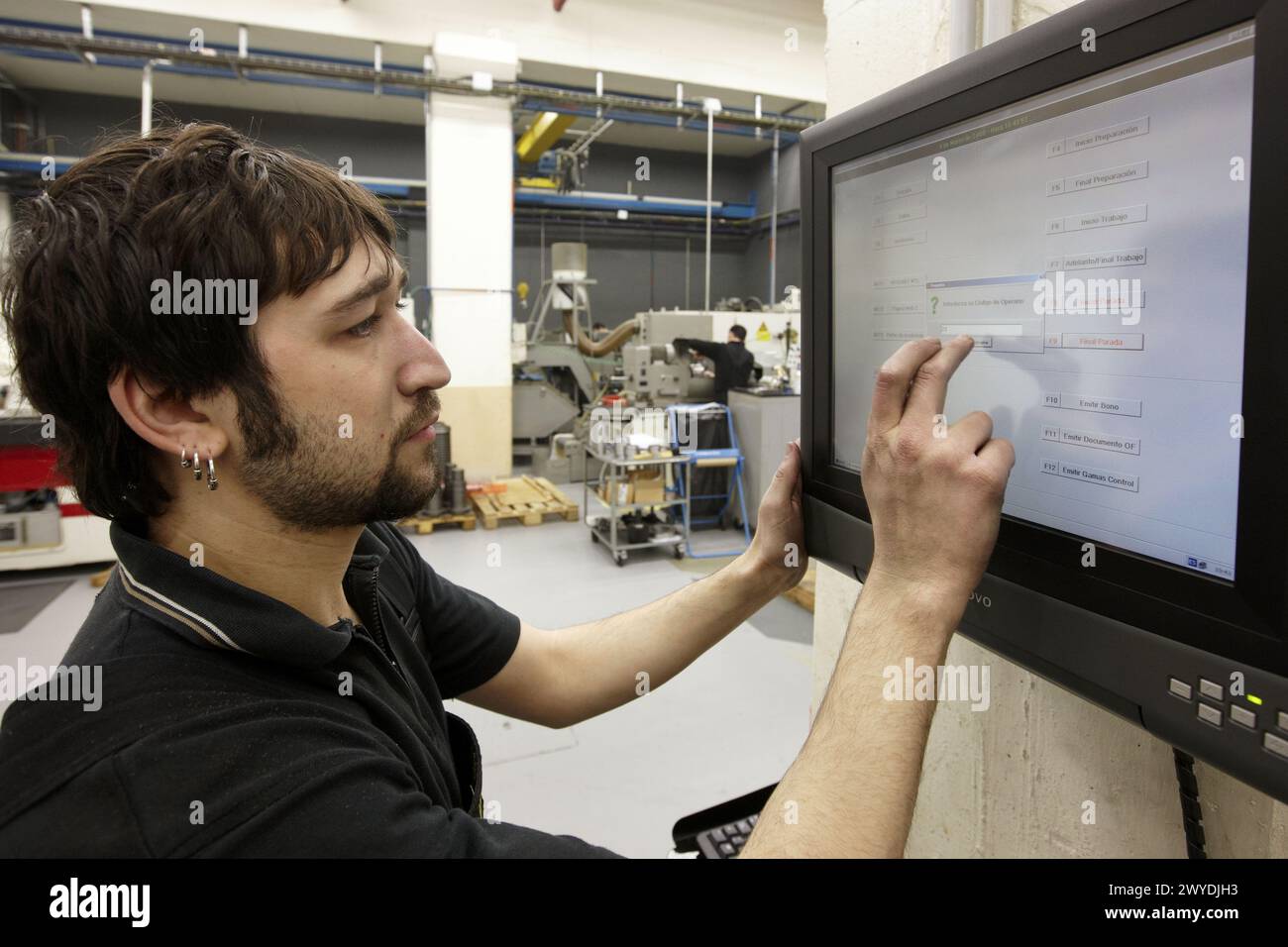 Registration control in production by imaging on touch screen, spindle manufacturing. Mendaro, Gipuzkoa, Euskadi, Spain. Stock Photo