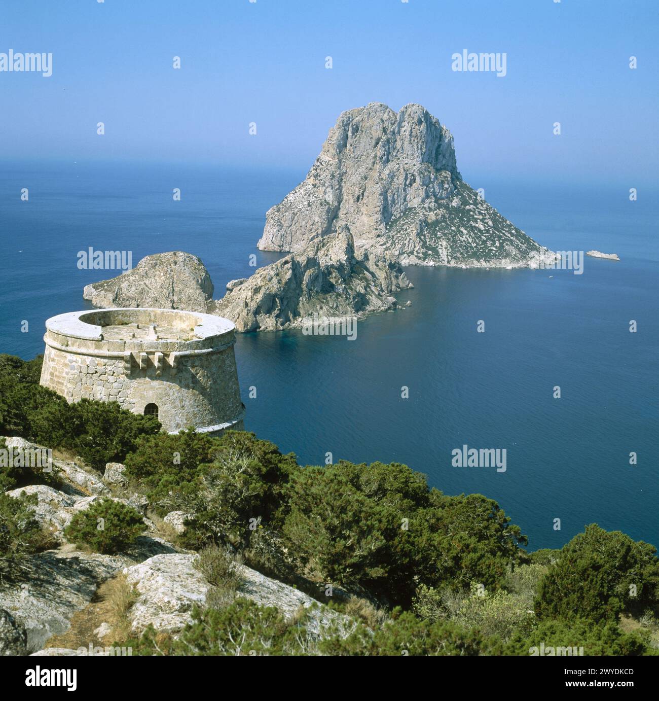 Torre des Savinar and Es Vedrà and Es Vedranell islands. Ibiza, Balearic Islands. Spain. Stock Photo
