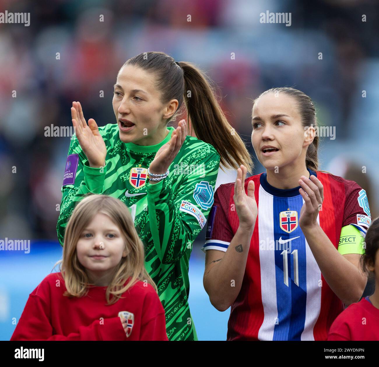 Oslo, Norway. 05th Apr, 2024. Oslo, Norway, April 5th 2024: Goalkeeper Cecilie Fiskerstrand (1 Norway) and Guro Reiten (11 Norway) are seen during the national anthem before the UEFA Womens European Qualifier football game between Norway and Finland at Ullevaal Stadium in Oslo, Norway (Ane Frosaker/SPP) Credit: SPP Sport Press Photo. /Alamy Live News Stock Photo