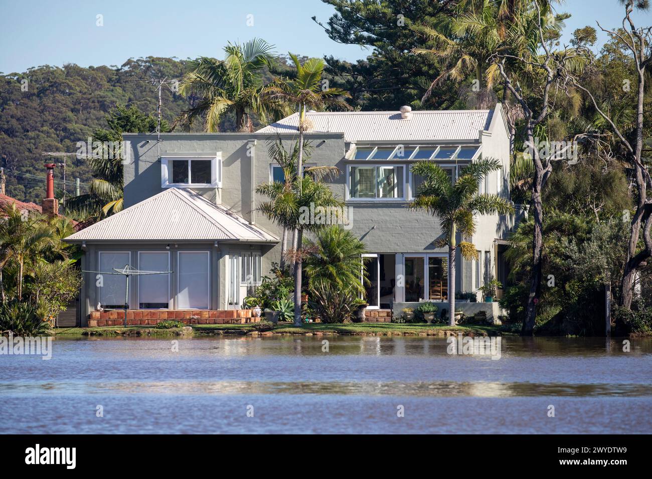 Saturday 6th April 2024. Sydney has been hit with a deluge of rain over the past 48 hours, with some areas including Penrith receiving the heaviest rainfall ever, In Narrabeen residents around Narabeen lagoon, pictured, have been asked to evacuate due to rising water levels from Narrabeen lake on Sydney northern beaches., where over 150mm of rain has fallen. There have been over 50 flood watches along rivers in New South Wales and Warragamba dam is expected to spill.  Credit Martin Berry @alamy live news. Stock Photo