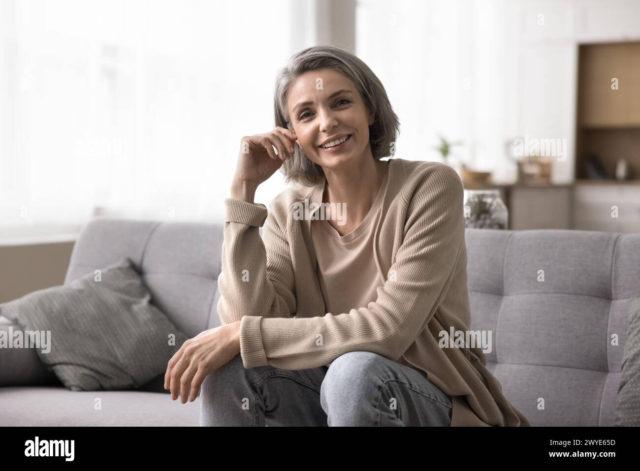 Beautiful mature woman posing in hi-res stock photography and images ...